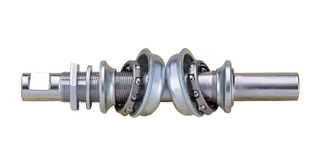 Cottered spindle with cage-mounted ball bearings