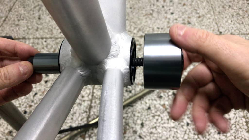 attaching bottom bracket retaining cup to bolt