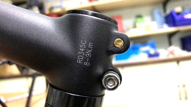 Torque setting calibration printed on bike stem